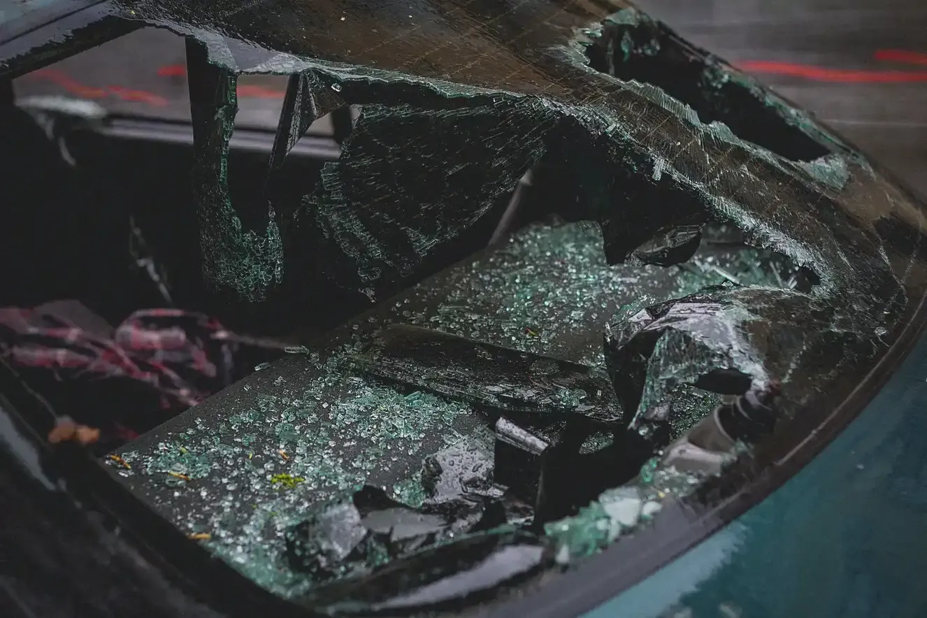 Close-up of a shattered windshield after a car accident
